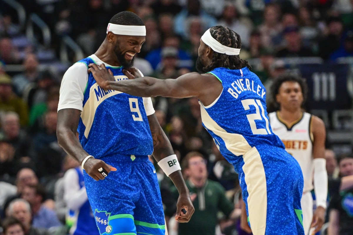 Milwaukee Bucks forward Bobby Portis (9) celebrates with guard Patrick Beverley (21)